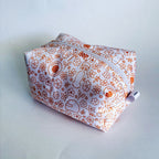 PRE-ORDER: Racing Make-up Pouch - Orange Floral Racing Icons